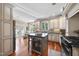 Spacious kitchen featuring stainless appliances, wine fridge, ample storage and countertop space at 1300 Heritage Club Ave, Wake Forest, NC 27587