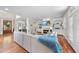 Bright living room features a fireplace, built-in shelving, and comfortable furnishings at 1300 Heritage Club Ave, Wake Forest, NC 27587