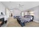 Spacious main bedroom features a fireplace, carpet floors and a seating area with great natural light at 1300 Heritage Club Ave, Wake Forest, NC 27587