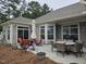 Expansive back patio area featuring outdoor furniture, a barbecue grill, and a relaxing outdoor space at 1357 Prevenient Dr, Wake Forest, NC 27587