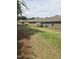 A lovely backyard view with green grass, showcasing the property's outdoor appeal at 1357 Prevenient Dr, Wake Forest, NC 27587