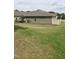 Well-maintained backyard with a lush green lawn, offering a private outdoor space at 1357 Prevenient Dr, Wake Forest, NC 27587