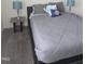 Bedroom featuring bed with gray bedding and accent pillows at 1357 Prevenient Dr, Wake Forest, NC 27587
