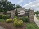 Community sign with beautiful landscaping and stonework at 1357 Prevenient Dr, Wake Forest, NC 27587