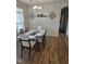 Dining room with natural light, decorative elements, and seating for six at 1357 Prevenient Dr, Wake Forest, NC 27587