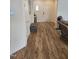 Inviting entryway featuring wood-look flooring, neutral paint, and white front door provides a warm welcome at 1357 Prevenient Dr, Wake Forest, NC 27587