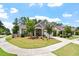 Beautiful home exterior showcasing manicured landscaping and a well-maintained lawn on a bright, sunny day at 1357 Prevenient Dr, Wake Forest, NC 27587