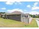 Home exterior with fence, lawn, and wood-look siding at 1357 Prevenient Dr, Wake Forest, NC 27587