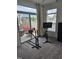 Flex room used for exercise, includes patio door access to outdoor seating area at 1357 Prevenient Dr, Wake Forest, NC 27587