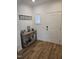 Bright entryway featuring hardwood floors, a stylish console table, and tasteful decor at 1357 Prevenient Dr, Wake Forest, NC 27587
