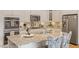 Well-equipped kitchen with granite countertops, stainless appliances, and decorative backsplash detail at 1357 Prevenient Dr, Wake Forest, NC 27587