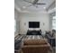 Spacious living room with recessed lights, a ceiling fan, comfortable furniture, and a sleek entertainment center at 1357 Prevenient Dr, Wake Forest, NC 27587