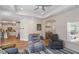 Open-concept living room with lots of seating and access to kitchen at 1357 Prevenient Dr, Wake Forest, NC 27587