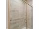 Tiled walk-in shower with frameless glass door and grab bar at 1357 Prevenient Dr, Wake Forest, NC 27587