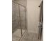 Walk-in shower featuring a glass enclosure and tiled walls at 1357 Prevenient Dr, Wake Forest, NC 27587