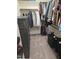 Walk-in closet with clothes, shoes, and storage at 1357 Prevenient Dr, Wake Forest, NC 27587