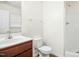 Bathroom with shower and sink with wooden vanity at 1506 Golden Bell Dr, Raleigh, NC 27610