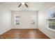 Empty bedroom with vinyl wood-look floors and lots of natural light at 1506 Golden Bell Dr, Raleigh, NC 27610