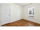 Bright bedroom featuring a window and closet at 1506 Golden Bell Dr, Raleigh, NC 27610