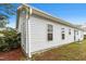 Exterior view of the home featuring clean siding and roof at 1506 Golden Bell Dr, Raleigh, NC 27610