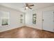 Empty living room features wood-look floors, natural light and a view into the dining room at 1506 Golden Bell Dr, Raleigh, NC 27610