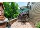 Back patio featuring an outdoor dining set at 1577 Tice Hurst Ln, Apex, NC 27502