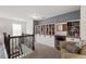 Upstairs reading nook with custom bookshelves and comfortable seating at 1577 Tice Hurst Ln, Apex, NC 27502