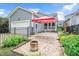 Private backyard featuring a charming patio with pavers, perfect for outdoor living and entertaining at 1633 Lakestone Village Ln, Fuquay Varina, NC 27526
