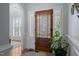 Foyer featuring a wood door with window shutters and a decorative rug at 1633 Lakestone Village Ln, Fuquay Varina, NC 27526