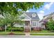Charming home featuring a covered porch, landscaped yard, and attractive curb appeal in a peaceful neighborhood at 1633 Lakestone Village Ln, Fuquay Varina, NC 27526