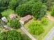 Aerial view of the residence surrounded by lush greenery at 1822 Routh Rd, Burlington, NC 27217