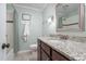 Bathroom featuring a granite countertop vanity, subway tile shower and bathtub with shower curtain at 1822 Routh Rd, Burlington, NC 27217