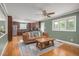 Inviting living area open to the kitchen, featuring a comfortable couch and natural light at 1822 Routh Rd, Burlington, NC 27217