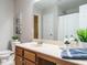Cozy bathroom featuring a single sink vanity, a neutral wall color, and a shower with a tub at 1833 Creek Oak Circle Cir, Fuquay Varina, NC 27526