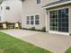 Spacious patio with chairs, a table and sliding glass doors at 1833 Creek Oak Circle Cir, Fuquay Varina, NC 27526