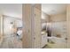 A combined bedroom and bathroom featuring coordinated decor, with modern fixtures and finishes at 1912 Parkside Village Dr, Clayton, NC 27520