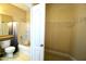 Bathroom featuring a shower and tub combination along with a closet at 1912 Parkside Village Dr, Clayton, NC 27520