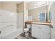 Bathroom with vanity and full bathtub at 1912 Parkside Village Dr, Clayton, NC 27520