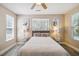 Inviting bedroom bathed in natural light with stylish decor and flooring at 1912 Parkside Village Dr, Clayton, NC 27520