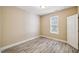 Bedroom with new floors, paint and bright windows at 1912 Parkside Village Dr, Clayton, NC 27520