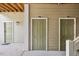 Exterior view showing the entryways to the units with numbered doors on the ground floor at 1912 Parkside Village Dr, Clayton, NC 27520