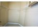 Spacious walk-in closet providing ample storage with wire shelving at 1912 Parkside Village Dr, Clayton, NC 27520
