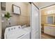 Laundry area with washer/dryer hookups near the bathroom at 1912 Parkside Village Dr, Clayton, NC 27520