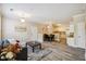 Spacious living room featuring wood floors, a comfortable seating area, and an open layout at 1912 Parkside Village Dr, Clayton, NC 27520