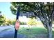 Street view of 1800 Parkside Village Dr with mature trees and a stop sign at 1912 Parkside Village Dr, Clayton, NC 27520