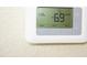 Close-up of thermostat showing temperature settings at 1912 Parkside Village Dr, Clayton, NC 27520