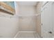 Walk-in closet boasting an efficient shelving system for optimal storage and organization at 1912 Parkside Village Dr, Clayton, NC 27520