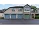 Charming townhome with four-car garage and stone accents at 201 Presque Isle Ln, Chapel Hill, NC 27514
