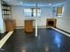 Spacious partially finished basement with drop ceiling and tile floors at 210 Crest Rd, Henderson, NC 27536