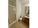 Bathroom featuring a stand up shower, vanity, sink, and toilet at 210 Crest Rd, Henderson, NC 27536